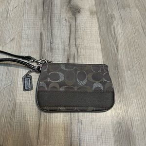 Classic Coach monogram wristlet